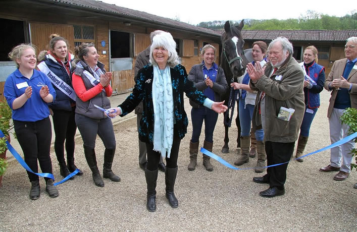 Jilly Cooper Racehorse Sanctuary cutting ribbon